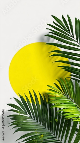 Bright Yellow Circle and Green Palm Leaves Create a Cheerful Atmosphere on a ...