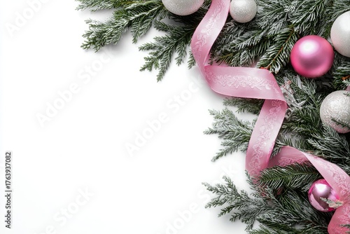 Decorative Holiday Arrangement With Pink and Silver Ornaments on Evergreen Br...