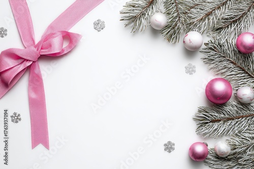 Decorative Holiday Arrangement With Pink and Silver Ornaments on Evergreen Br...