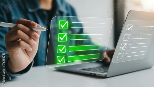 Person using a stylus to check off items on a digital checklist displayed on a transparent screen in front of a laptop motion animated video