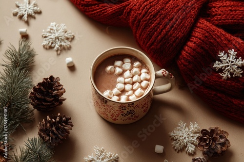 Hot Chocolate With Marshmallows Surrounded by Winter Decor on a Cozy Table Se...