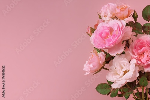 Beautiful Bouquet of Pink Roses on a Soft Pink Background for a Cheerful Deco...