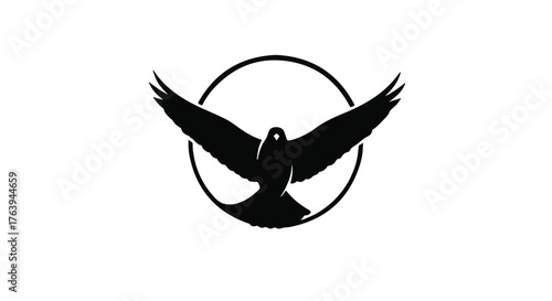 Striking black silhouette of a bird of prey with open wings inside a circular frame