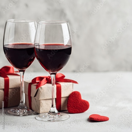 Romantic Setting With Red Wine Glasses and Gifts for Special Celebration