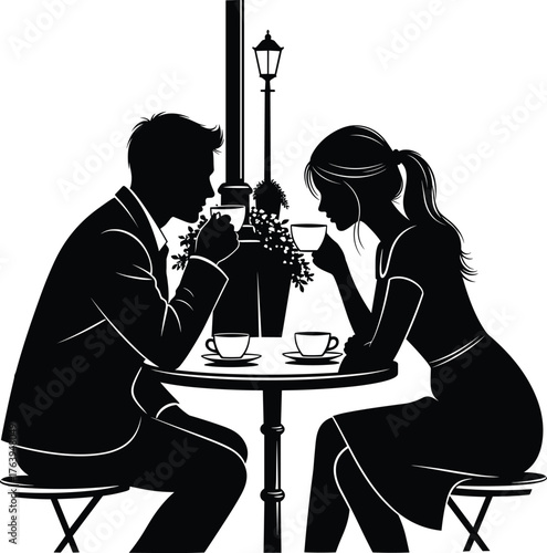 Romantic silhouette of a couple enjoying coffee at an outdoor cafe table