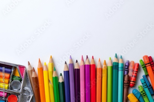 Collection of Colorful Pencils and Markers Arranged Neatly on a White Background