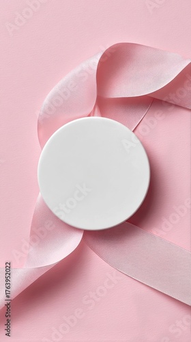 Simple White Container With Soft Pink Ribbon on Pastel Background
