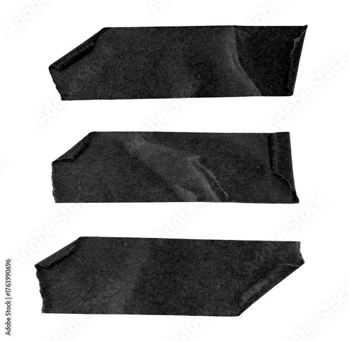 Set of different black sticky tapes isolated on a white background, black paper adhesive tape strips of various sizes on a transparent background.	