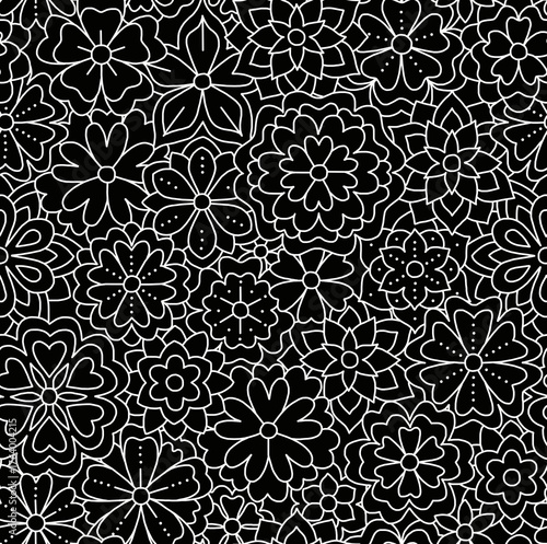 Floral black and white pattern on a black background, abstract design, seamless background.