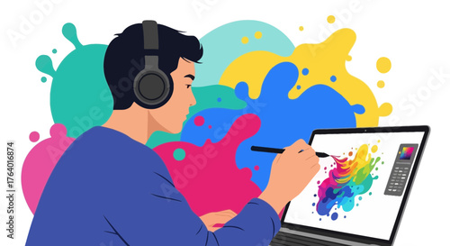Creative designer working on a laptop with colorful splash art design