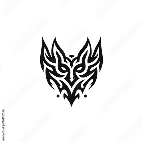 black tribal tattoo design of a stylized fox head with sharp ears and intricate patterns.