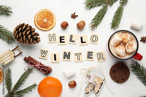 Text HELLO WINTER with nuts...
