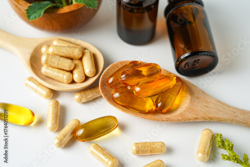 Alternative medicine herbal organic capsule vitamin E omega 3 fish oil drug herbs leaf natural