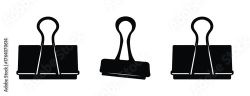 Three black binder clips arranged horizontally for office organization and document management applications