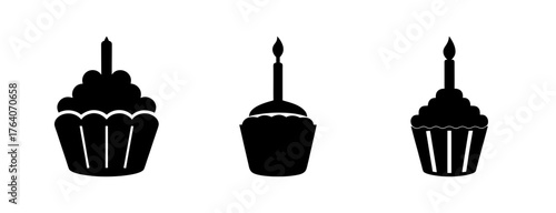 Three black silhouette cupcakes with candles for birthday celebrations party treats festive design elements
