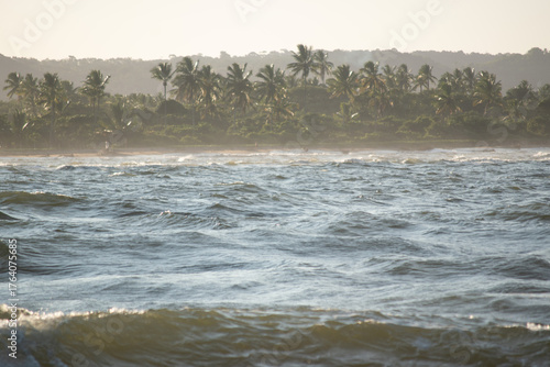Traditional cultural fishing boats gathered at sea during the Yemanjá celebration on February 2nd in Brazil. A powerful scene that blends faith, culture, and maritime tradition, with decorated boats h
