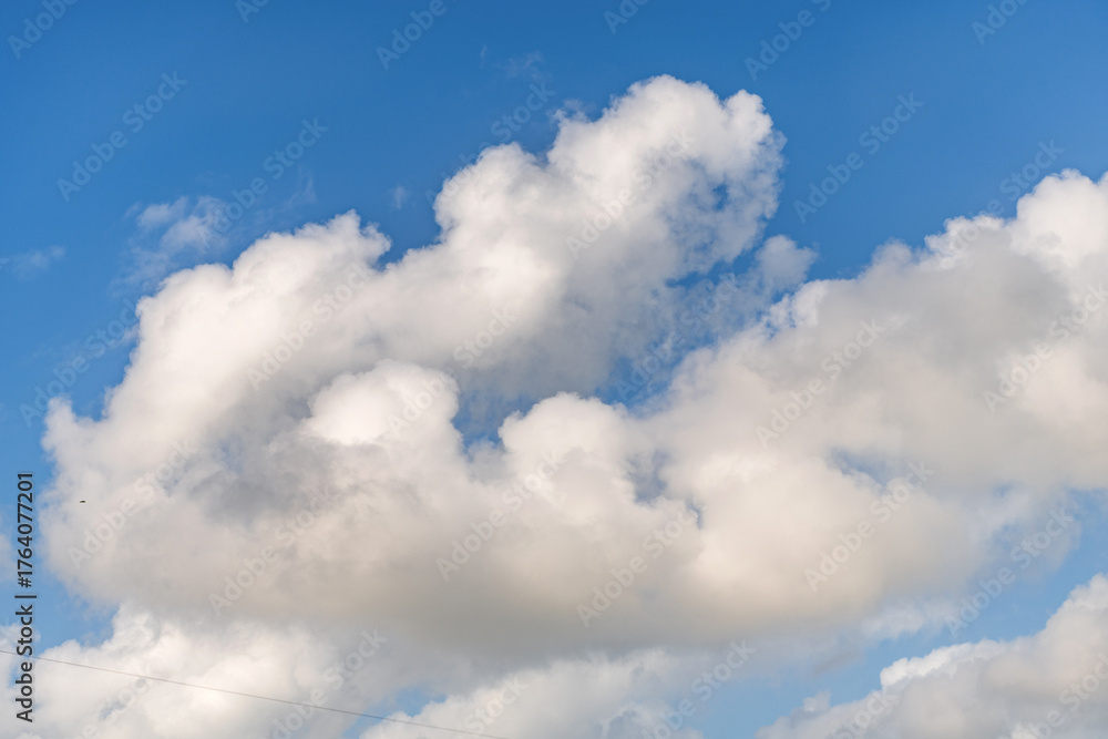 Fototapeta premium Cloud in the sky. Background with cloud. Gloomy sky with overcast clouds. Skyscape and cloudscape. Sky with clouds. Cloudy skyscape background. Cloudscape sky background. Moving clouds