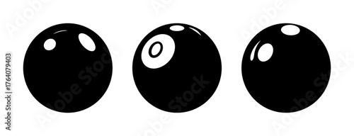 Three realistic black billiard balls showcasing spherical form and subtle reflections perfect for game design