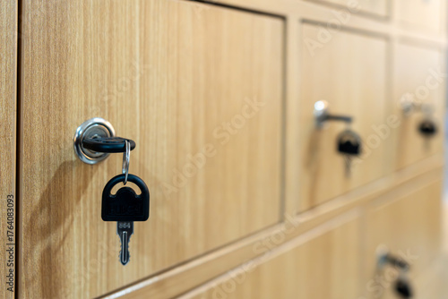 Foto Wooden locker with hanging keys for deposit box in public facilities and service