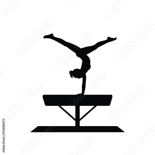 Silhouette of a female gymnast performing a handstand on a balance beam