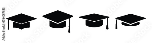 Four distinct graduation caps with tassels celebrate academic achievement and successful education