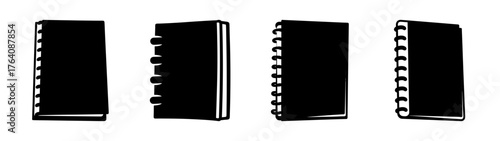 Collection of four black spiral bound notebooks displayed in different orientations and angles