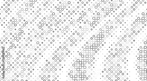 A grayscale halftone pattern featuring various sizes of circles and dots arranged diagonally across a white background, creating a modern and visually dynamic texture effect