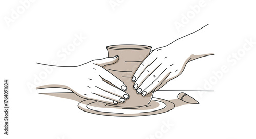 Hands shaping clay on pottery wheel creating a ceramic pot in a studio setting