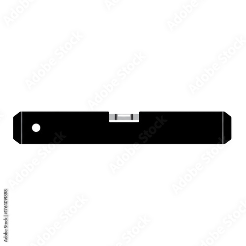 Shadowy level tool on dark surface