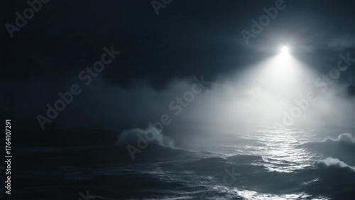 Lighthouse beacon illuminates foggy dark ocean with rough waves and moody atmosphere