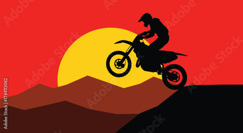 Motocross rider silhouette jumping at sunset extreme sports action