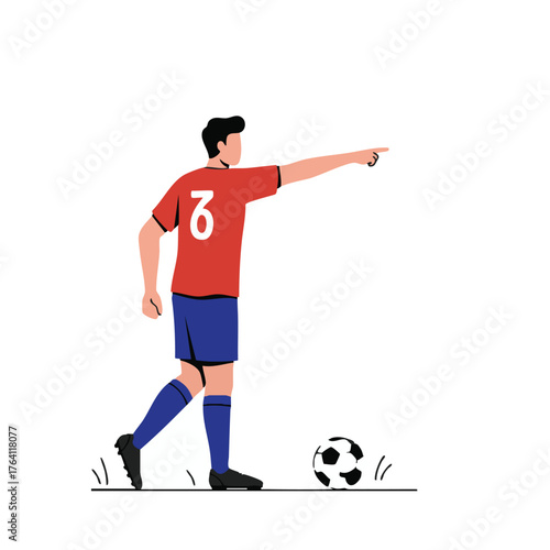 Soccer Player Pointing Forward with Ball.