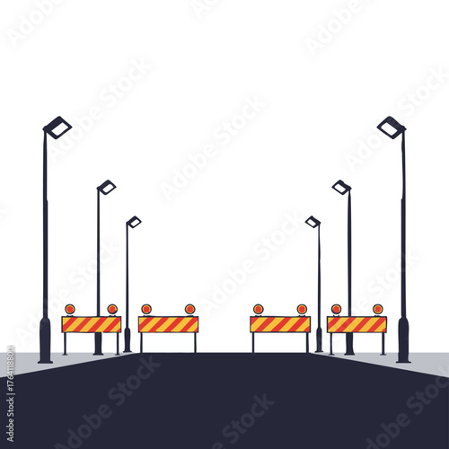 Street construction barriers and streetlights.