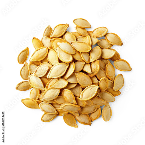 A pile of pumpkin seeds on a white background.
