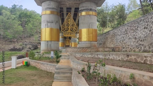 park under fly over with big concrete pillar