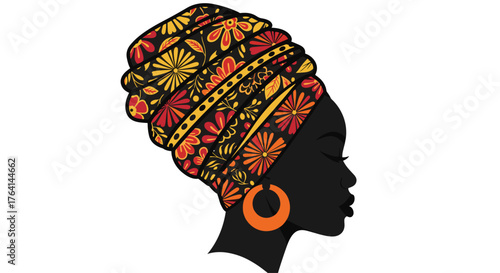 Silhouette of a Woman Wearing a Vibrant African Headwrap and Large Hoop Earrings.
