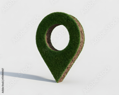 Vibrant green grass map pin symbol crafted from lush turf and rich soil, signifying eco friendly exploration and sustainable discovery for global navigation