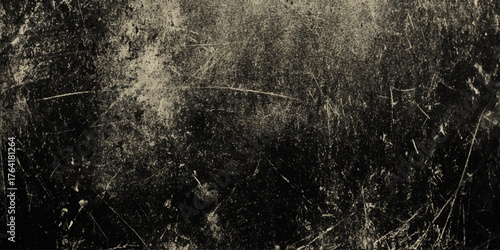 Mysterious dark gray wall texture with industrial concrete tones, artistic grunge detail and warm tone in background.