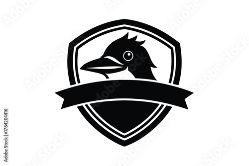 Raven emblem crest shield with ribbon heraldry symbol