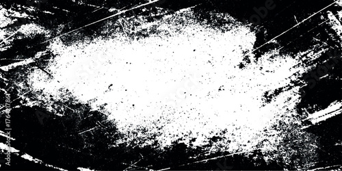 Black patches and rough scratch marks while transitions into lighter scattered textures and streaked diagonal lines.