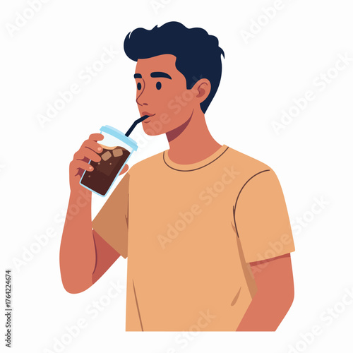 Young man drinking iced coffee from a plastic cup with a straw, isolated on white background.