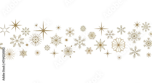 Golden snowflakes arranged horizontally on a white background