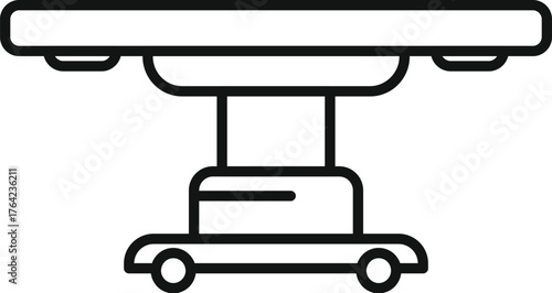Surgical table with lamps standing in operating room, ready for surgery