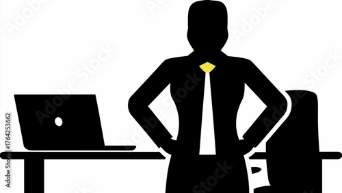 Silhouette of a businesswoman standing with arms akimbo in an office with a laptop and chair nearby