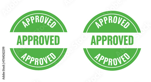 Two green approved stamps or seals displayed on a white background