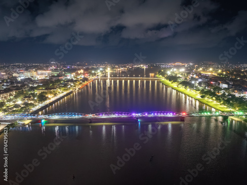 Wallpaper Mural Panoramic view of Truong Tien Bridge in Hue City at night. Bridge illuminated all over with blurry reflection on. Travel and landscape concept Torontodigital.ca