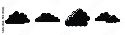 Collection of four distinct black cumulus clouds in silhouette on