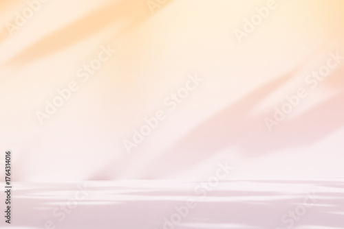 Abstract beige color gradient studio background for product presentation. Empty room with shadows of flowers and plant leaves. 3d orange room with copy space. Summer concept. Blurred backdrop