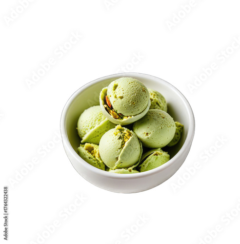 Pistachio ice cream balls in a small white bowl