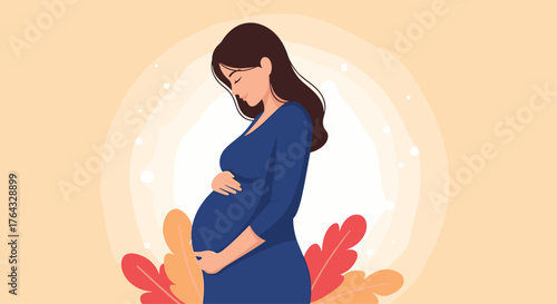 Pregnant woman in blue dress gently cradling her baby bump.
